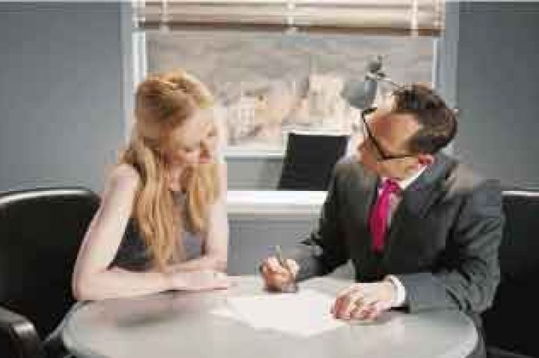 Woman getting legal advice from solicitor