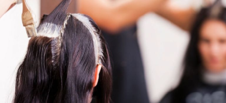 Lady getting hair dyed at haridressers