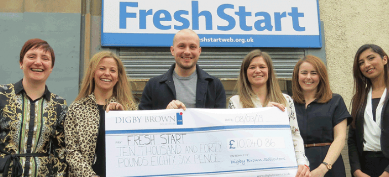 Cheque handover outside FreshStart