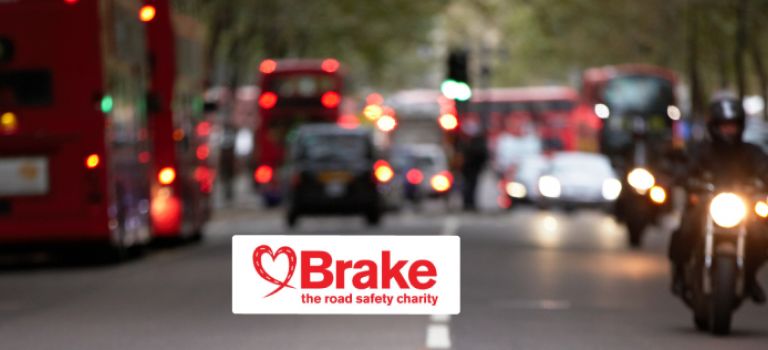 Cars, buses and motorbike traffic in town