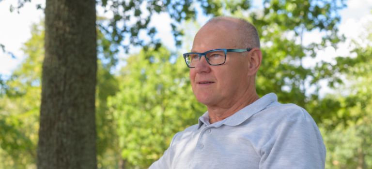 Man in park on bench