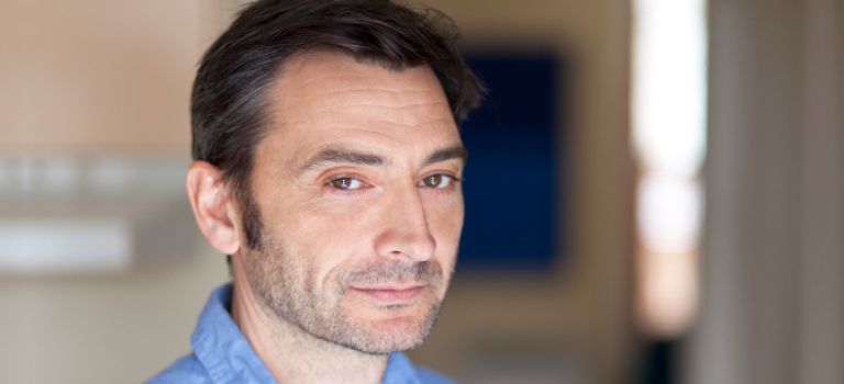 Man looking to camera