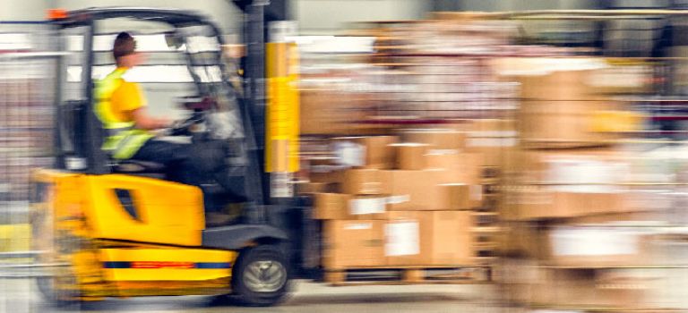 Forklift in warehouse