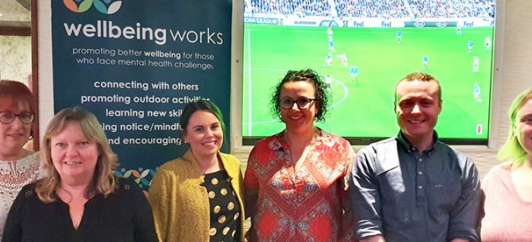 Wellbeing Works with Digby Brown Dundee staff at charity quiz