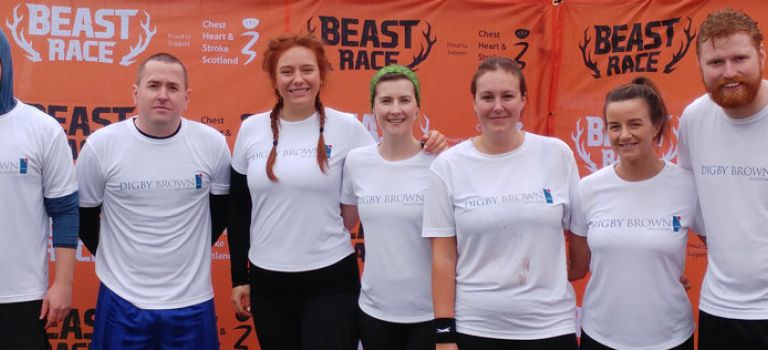 Inverness Office standing in front of the Beast Race 2019 banner before the event begins