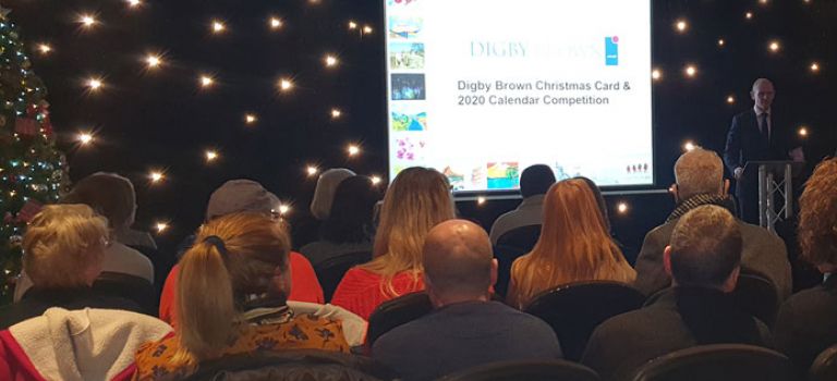 Chris Stewart welcoming Christmas Card and 2020 Calendar winners at awards ceremony in Glasgow