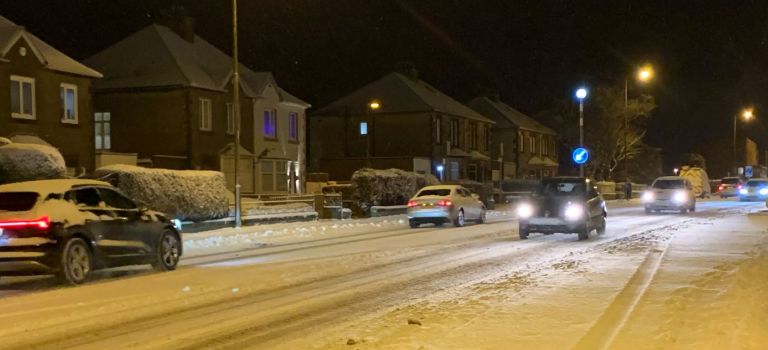 Cars driving in snowy conditions