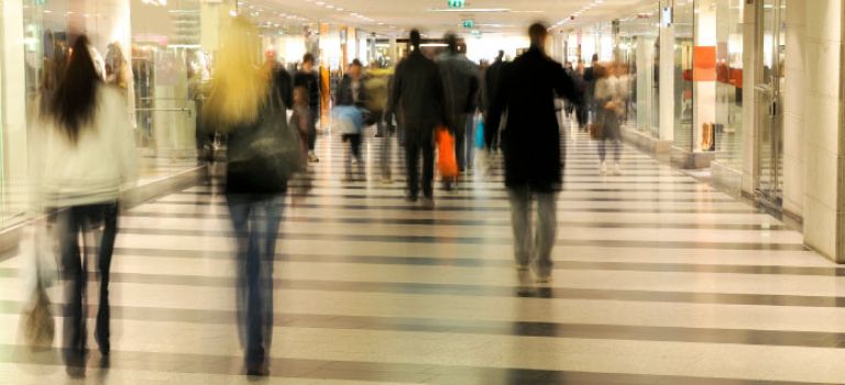 People walking through a shopping centre