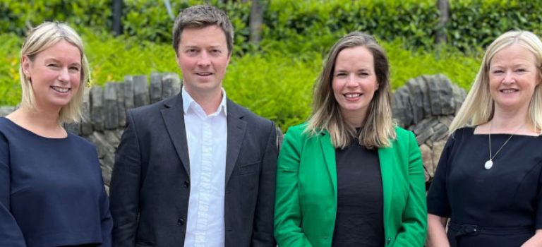 Four of Digby Brown's new partners standing next to each other.