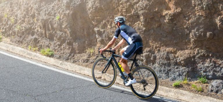 Man cycling abroad on the road