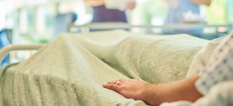 Woman in hospital bed