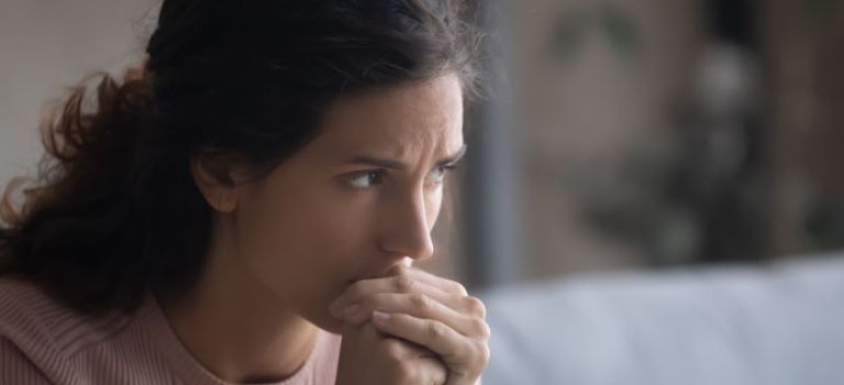 Woman looking thoughtful