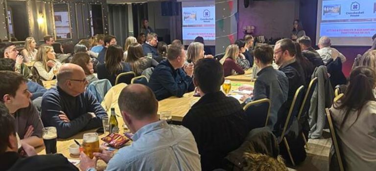 Glasgow office raise thousands for Crossbasket House with bumper quiz night