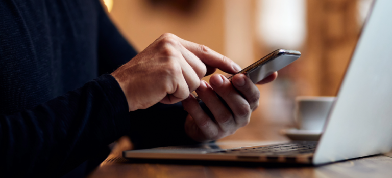 Person typing on a mobile phone
