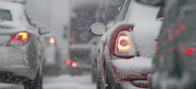 Car Driving in Winter Snow