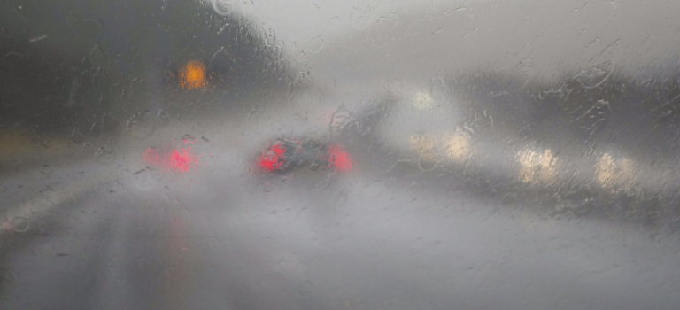 Cars on a motorway in rain