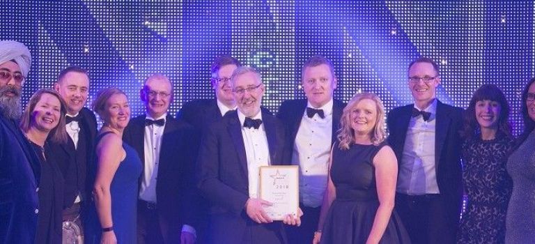 Digby Brown receiving Firm of the Year Award 2018