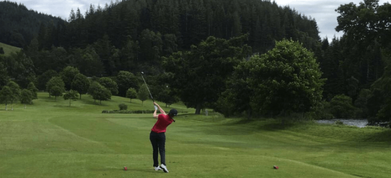 Inverness office golfing callenge for Macmillan Cancer Support