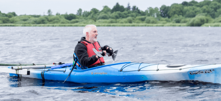 Man Kayaking at Spinal Injuries Scotland Activities Day