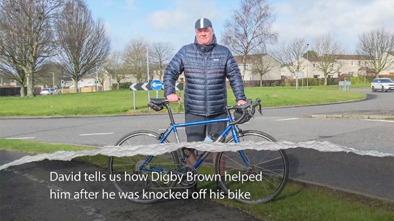 David with his bike at a roundabout